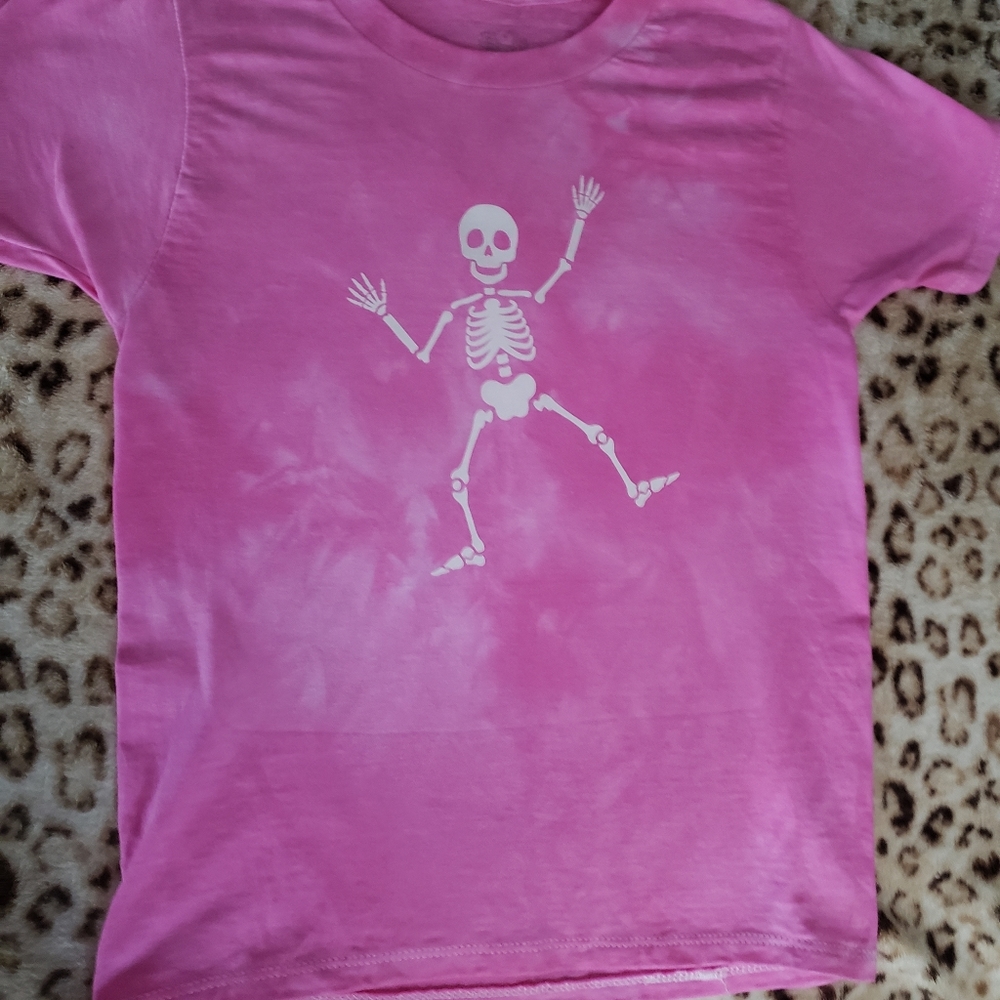 Pink scrunch tie dyed lightweight cotton tshirt. Glow in the dark skeleton.